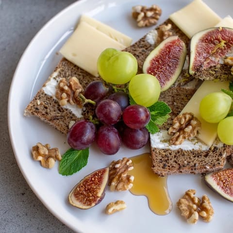 A beautifully styled Harvest Scythe, with a close-up of fresh bread and ripe fruits.