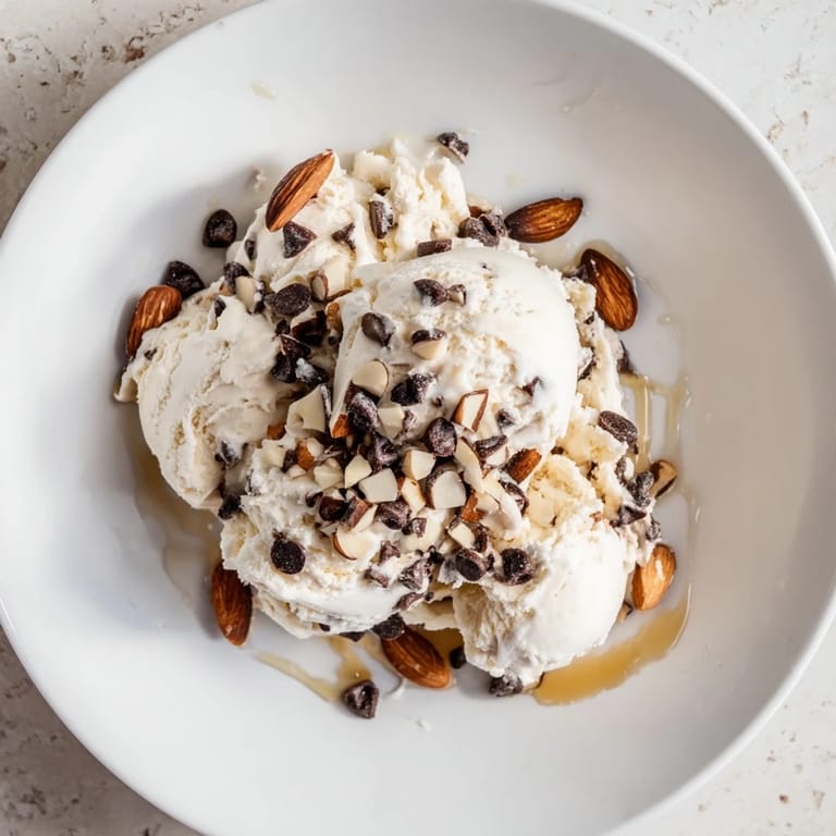 Frozen, smooth cottage cheese ice cream with a hint of vanilla ready to serve.